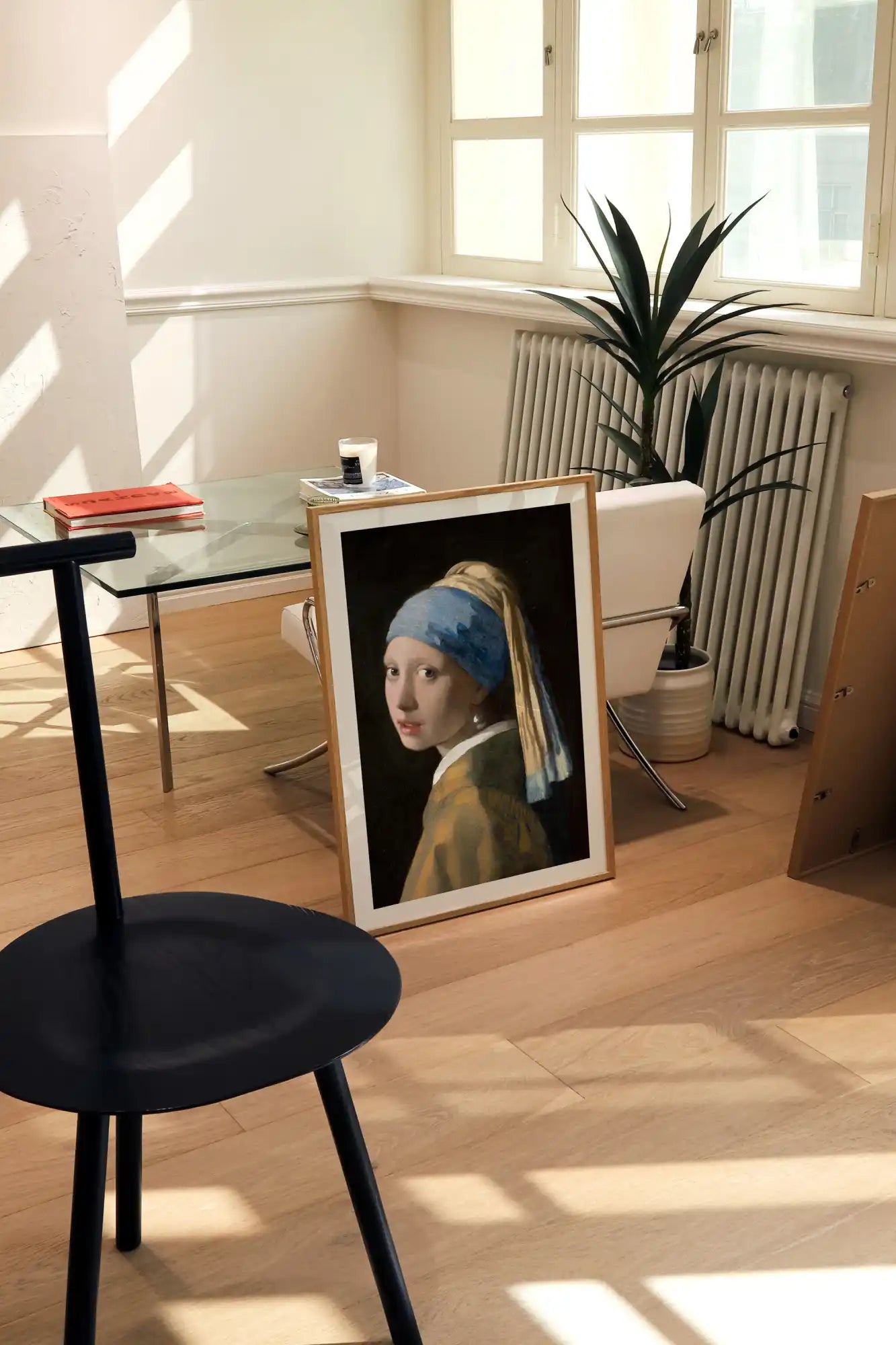 Ingelijste print van 'Meisje met de parel'.