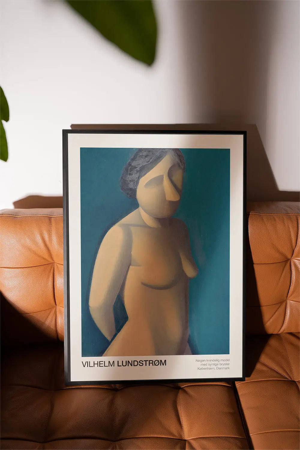 Wanddecoratie met een ingelijste naakt kunstprint uit de Vilhelm Lundstrom Poster collectie